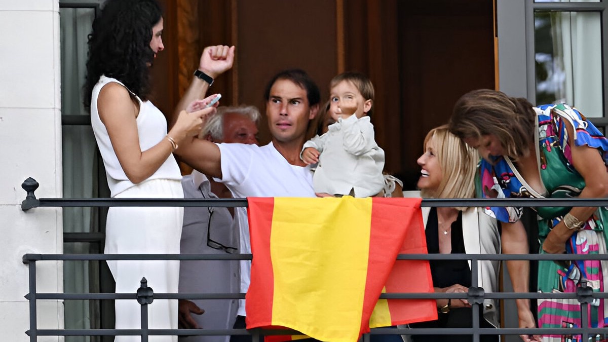 Rafael Nadal with family and celebrating with his team.